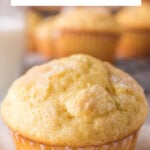 A closeup of a vanilla muffin with a title text overlay for Pinterest.