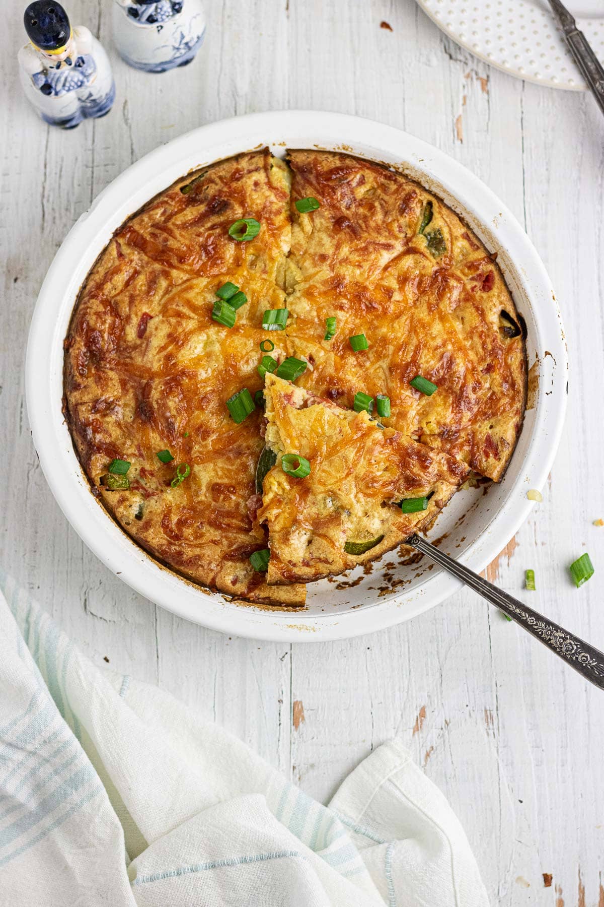 An overhead photo of crustless zucchini quiche in a serving dish.