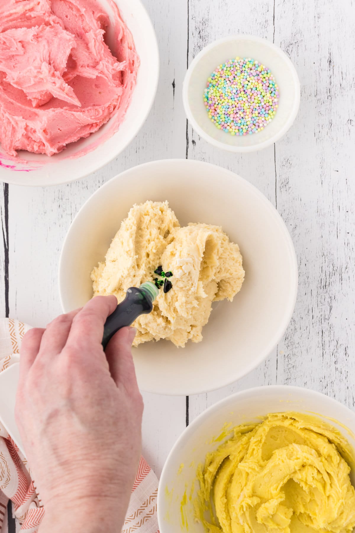 Coloring the dough with food coloring.