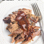 Overhead view of bbq brisket on a white plate with a title text overlay.