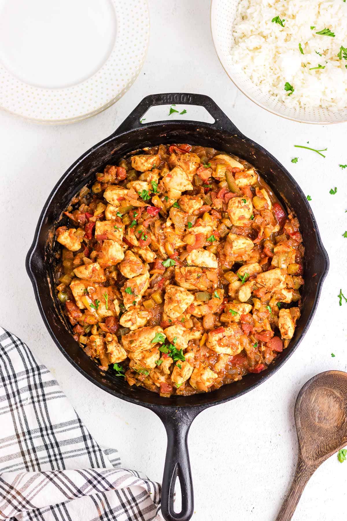 Creole chicken and rice in a skillet.