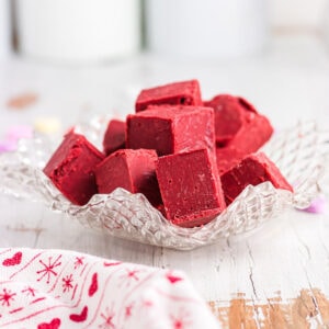 A candy dish with red velvet fudge in it.