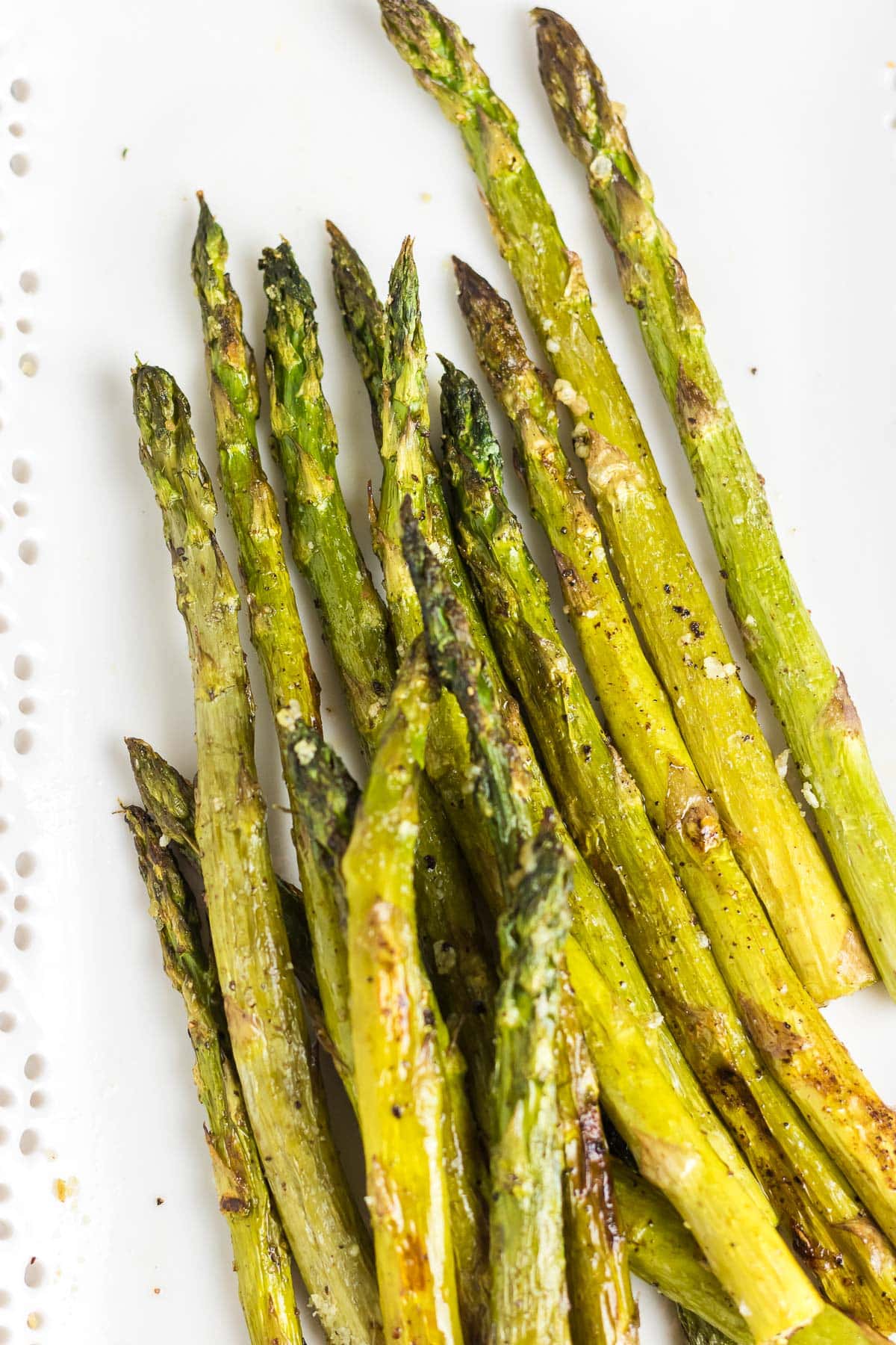 An up-close photo of roasted asparagus spears.