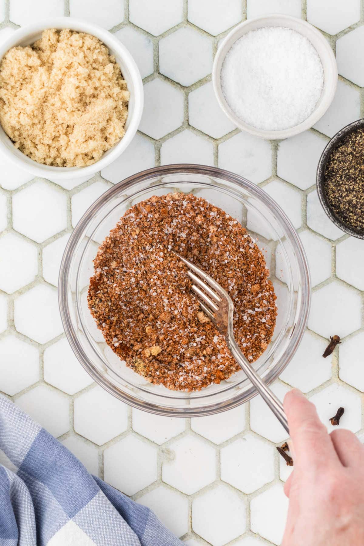 Dry rub ingredients being mixed together.