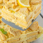 A slice of lemon icebox cake being served with a title text overlay for Pinterest.