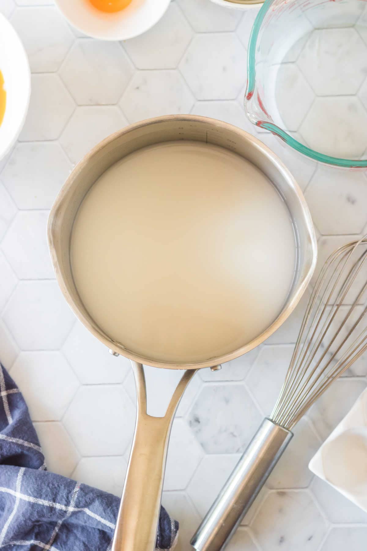 Cornstarch and water mixture in a pan.