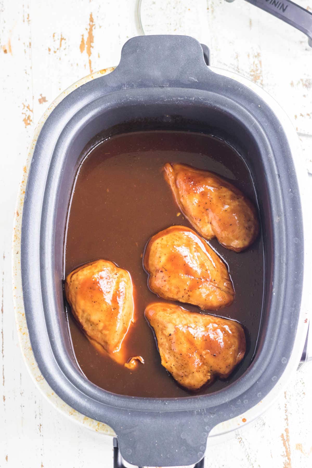 Cooked chicken in slow cooker.