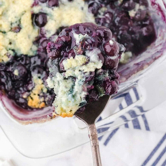 A spoonful of blueberry cobbler.