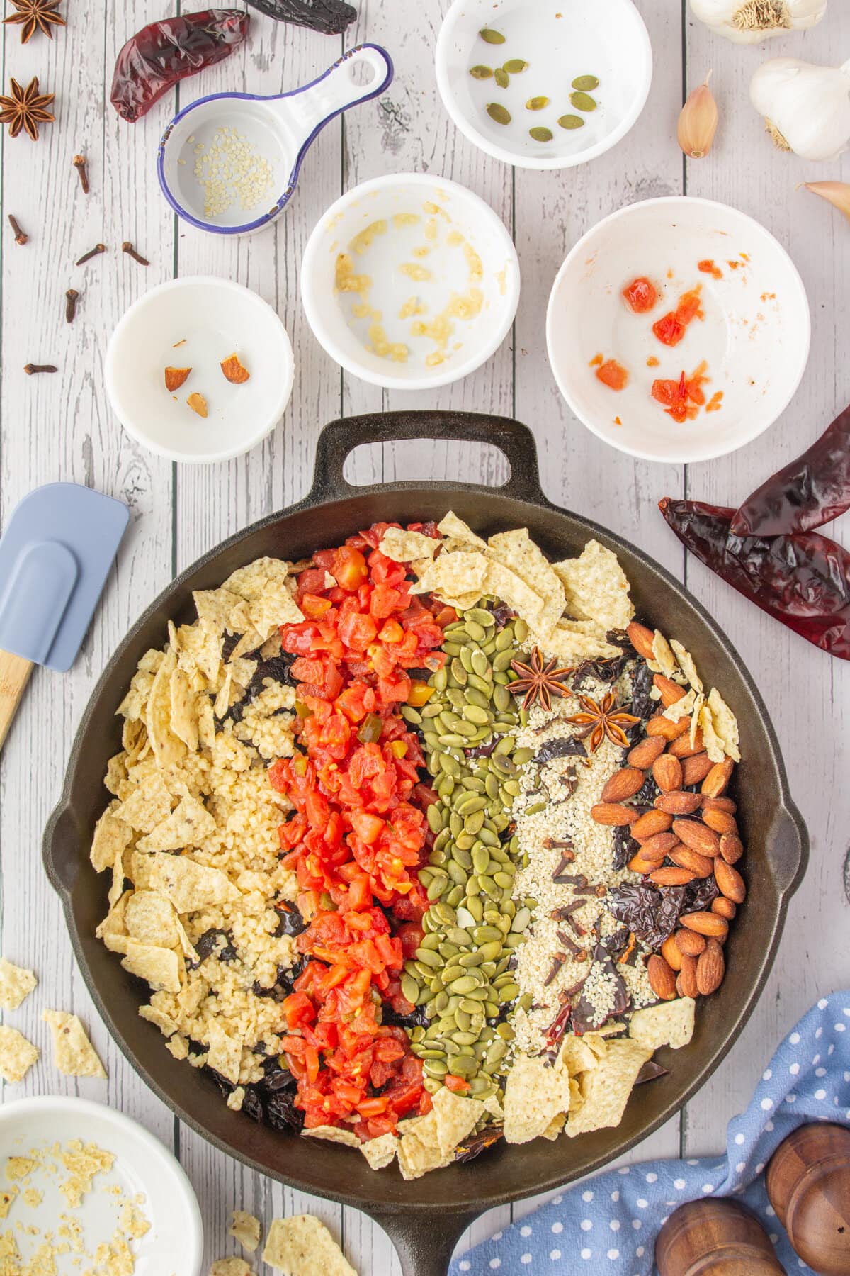 Nuts, tortillas, and remaining dry ingredients added to the skillet.