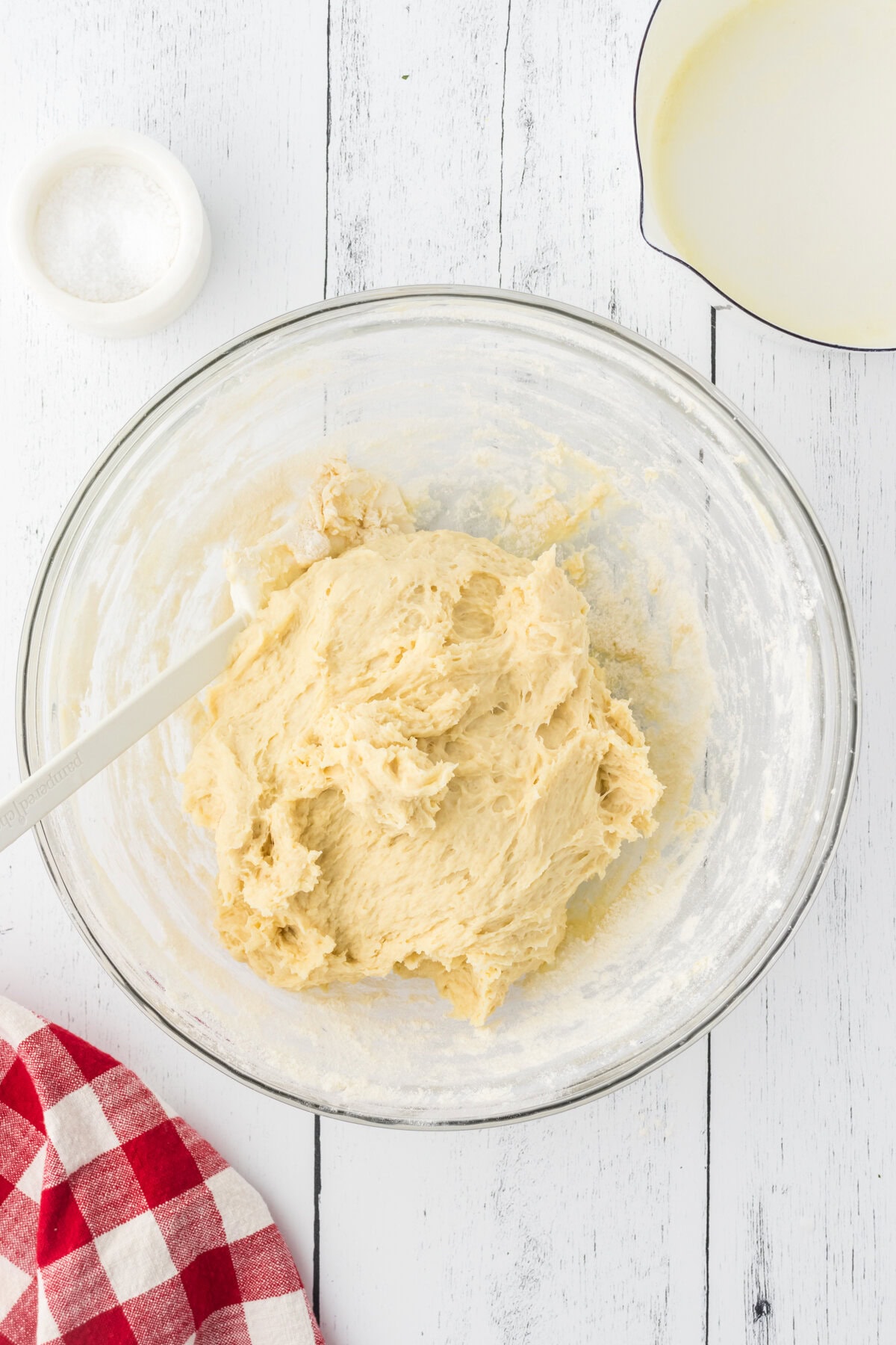 A sticky dough is formed.