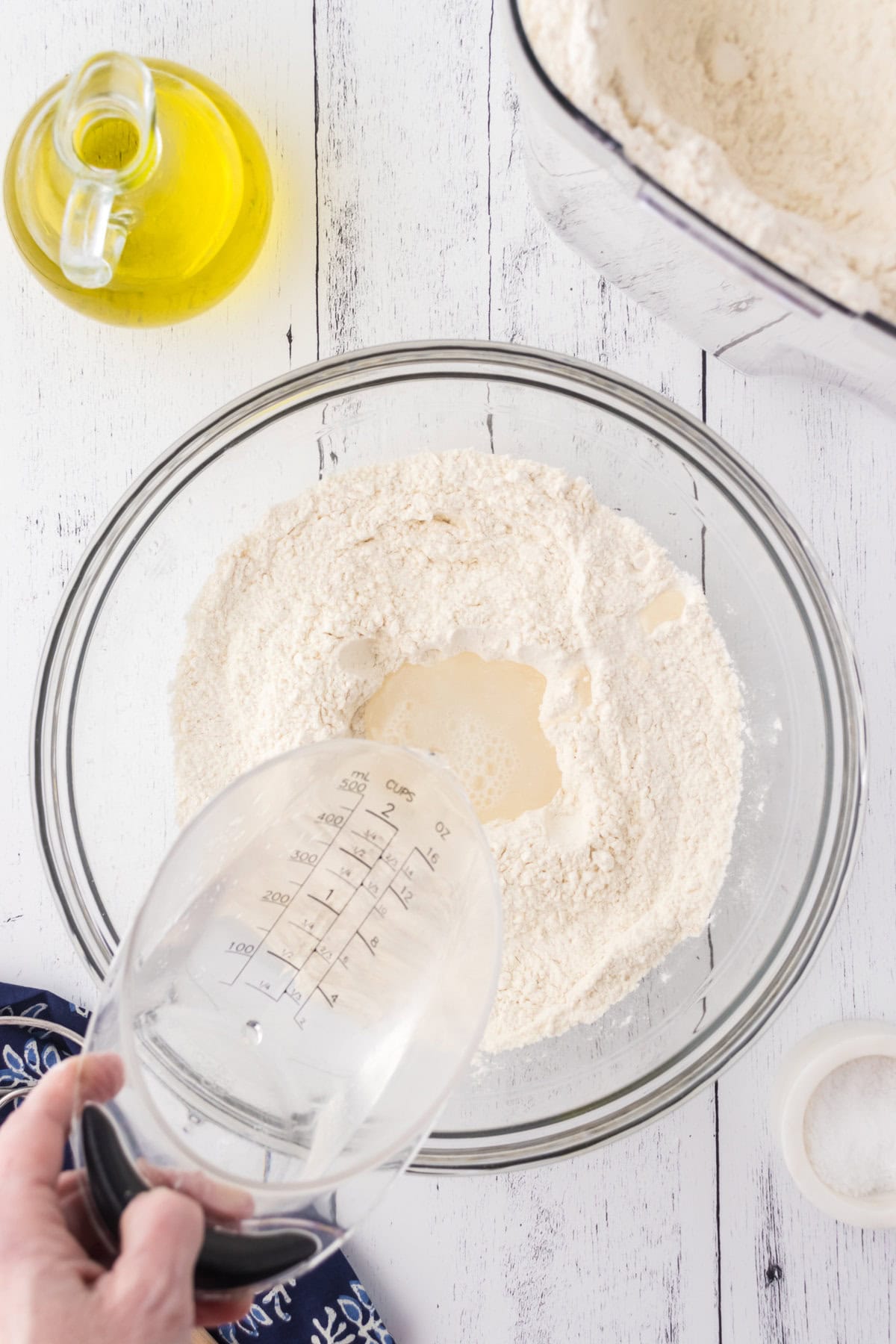Water being added to the flour mixture.