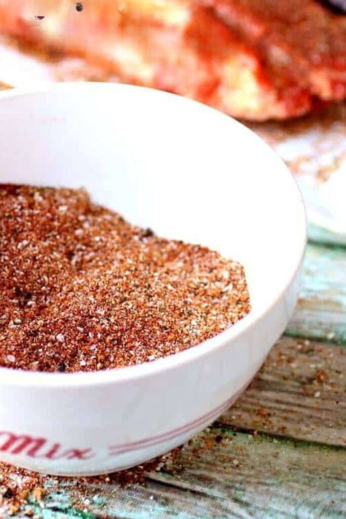All purpose dry rub in a white bowl.