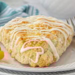 Closeup of a scone on a plate.