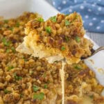 A serving of Swiss chicken & stuffing casserole being served.