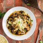 Overhead view of pork chile verde in a white bowl