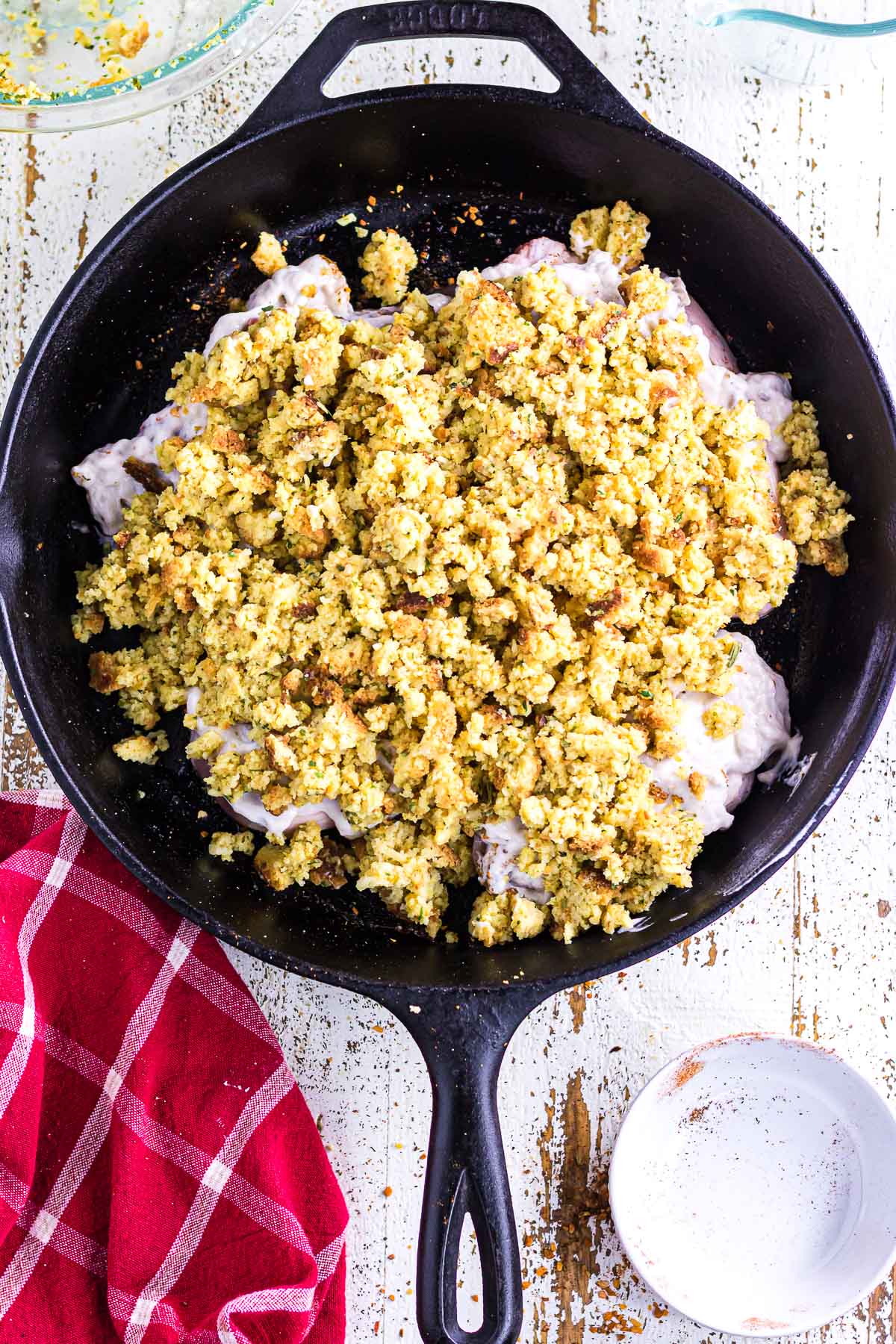The cornbread stuffing mix added on top of the soup and pork chops.