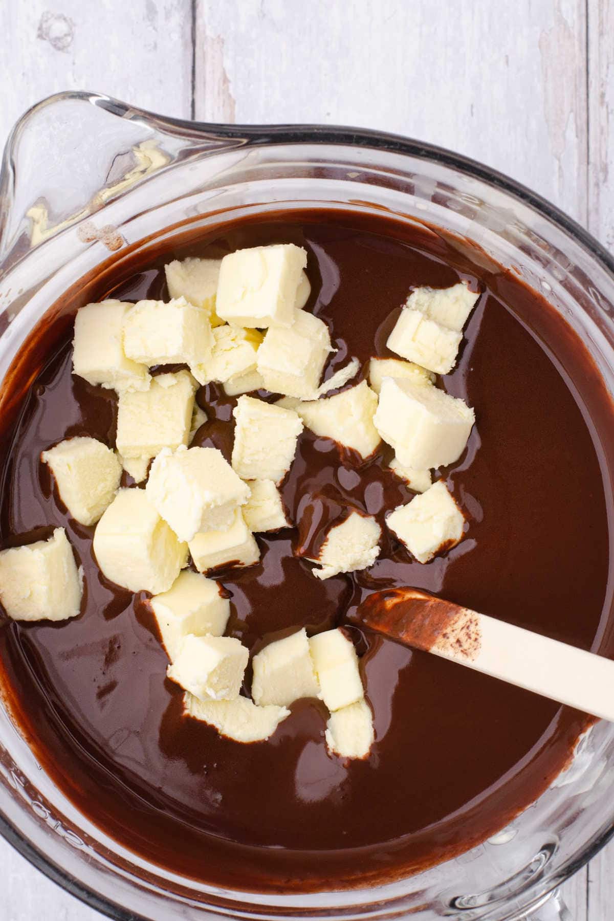 Melting chocolate and butter together.