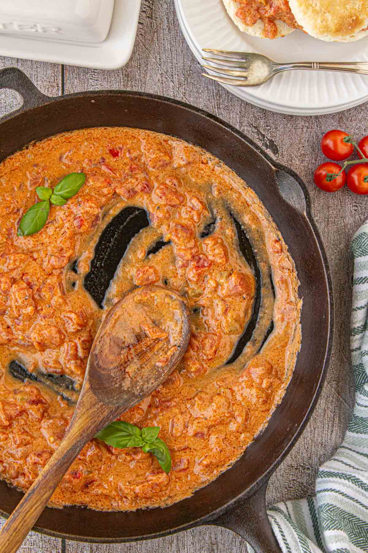 Overhead view of tomato gravy in a skillet.