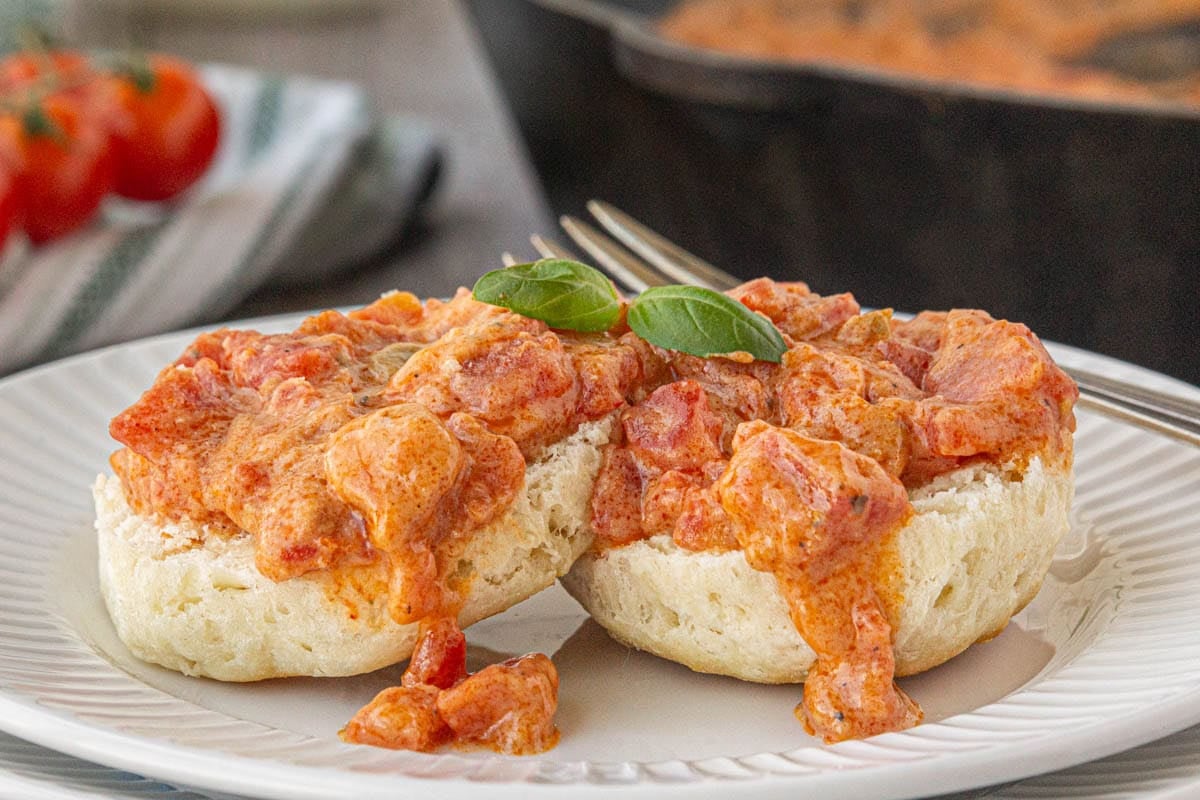 Tomato gravy spooned over hot buttermilk biscuits.