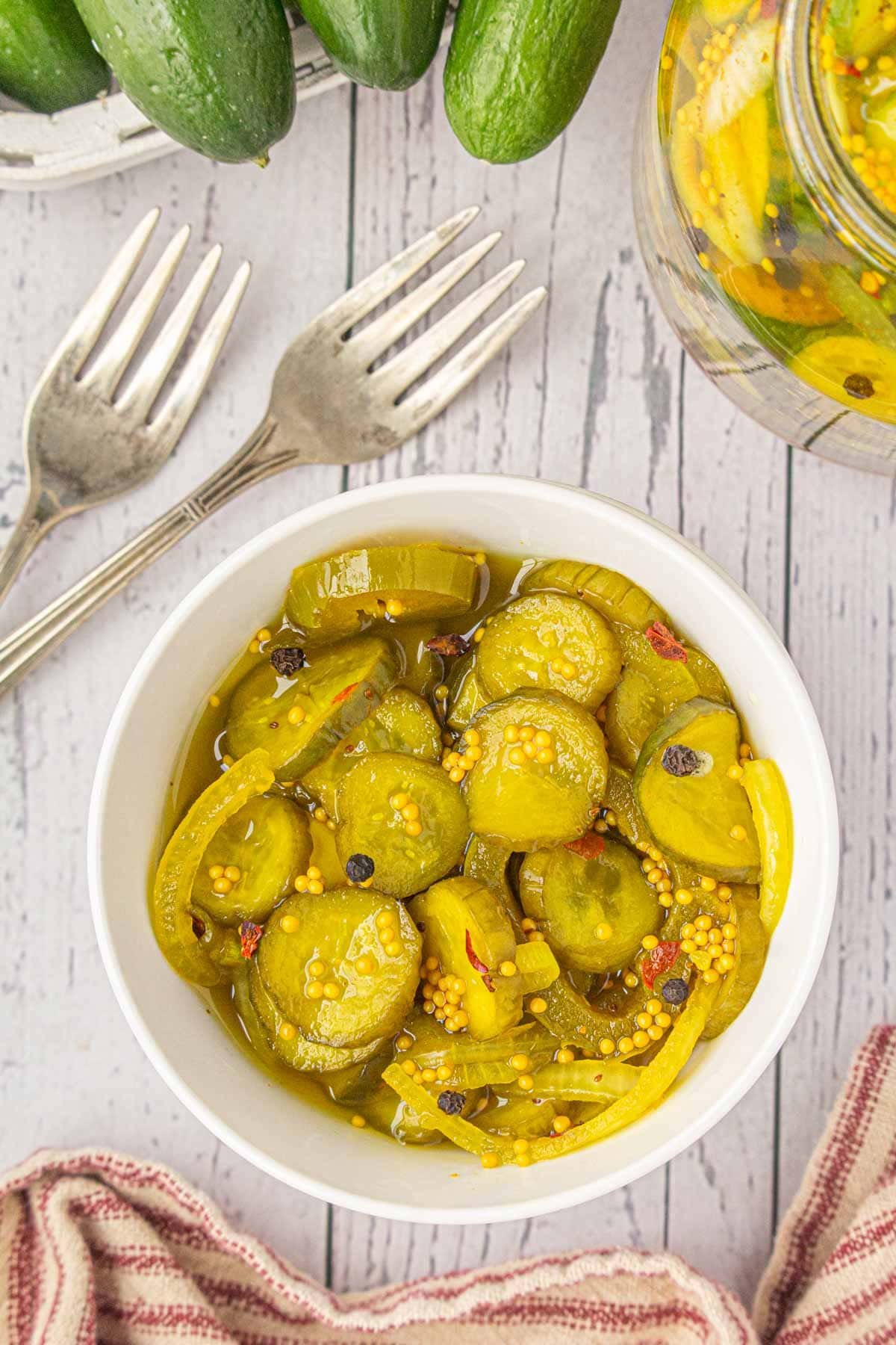 Overhead view of a bowl of sweet heat pickles.