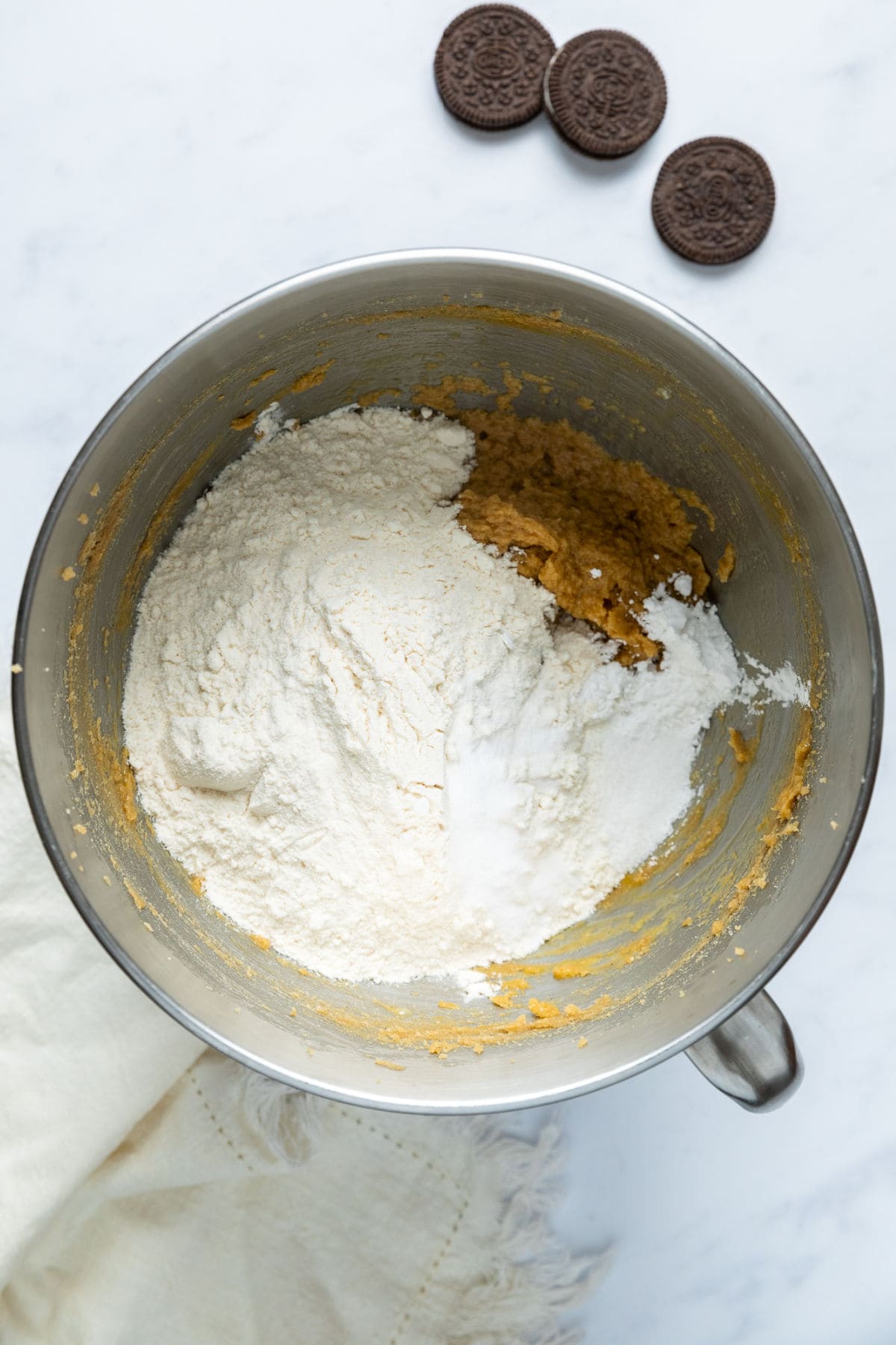 Dry ingredients being stirred in to the butter mixture.