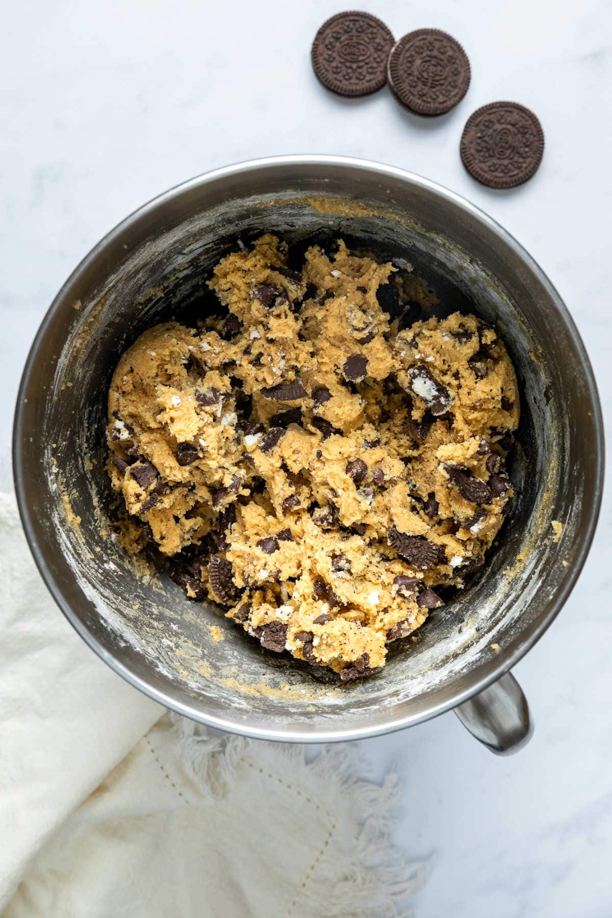 Cookie dough with chocolate chips and Oreos stirred in.