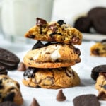 Finished homemade Oreo Chocolate Chip cookies cooling on parchment paper.