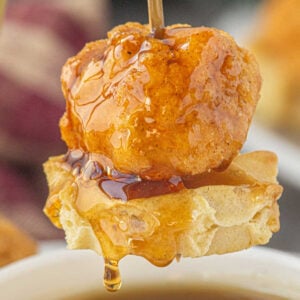 Chicken and waffle skewers dipped in buttery maple chipotle sauce.
