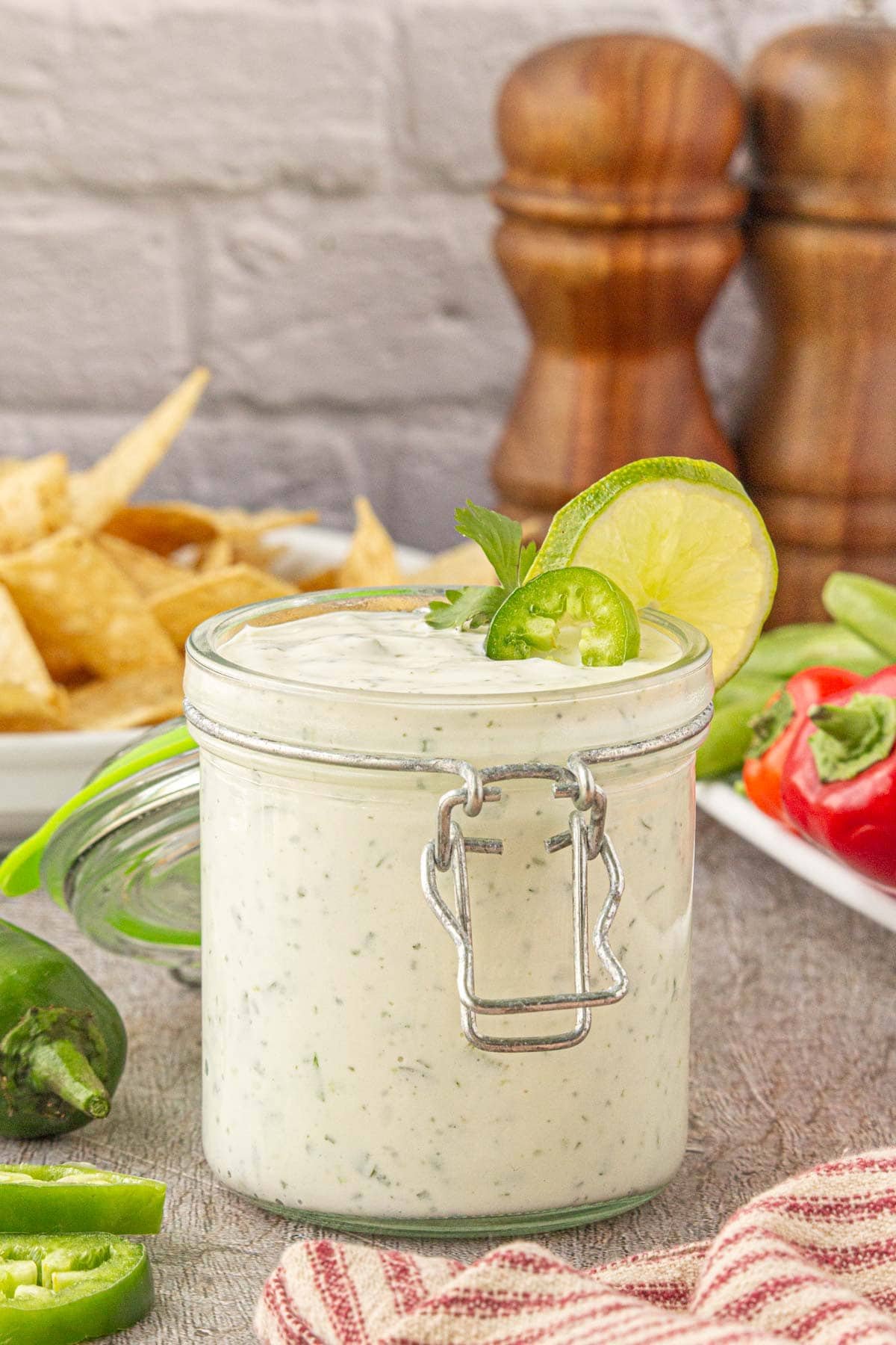 Jalapeno ranch dip in a storage jar.