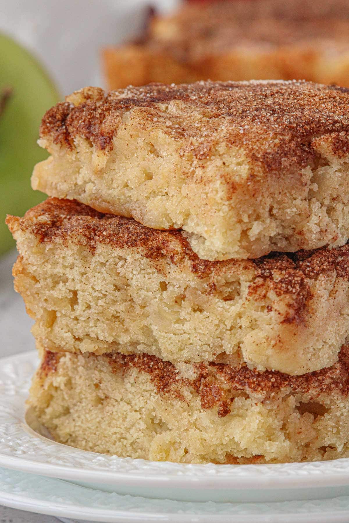 Closeup of the apple snickerdoodle bars showing the chewy texture and cinnamon sugar topping.
