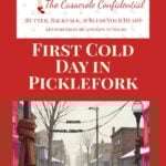 Restless Chipotle Casserole Confidential graphic titled “First Cold Day in Picklefork,” showing a quiet small-town winter street with snow-lined sidewalks, brick storefronts, benches draped with blankets, and lampposts wrapped in red scarves.