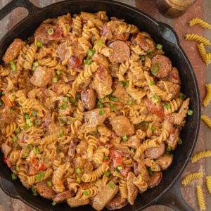 Cajun chicken and sausage pasta skillet with creamy Cajun sauce smoked sausage chicken and rotini pasta