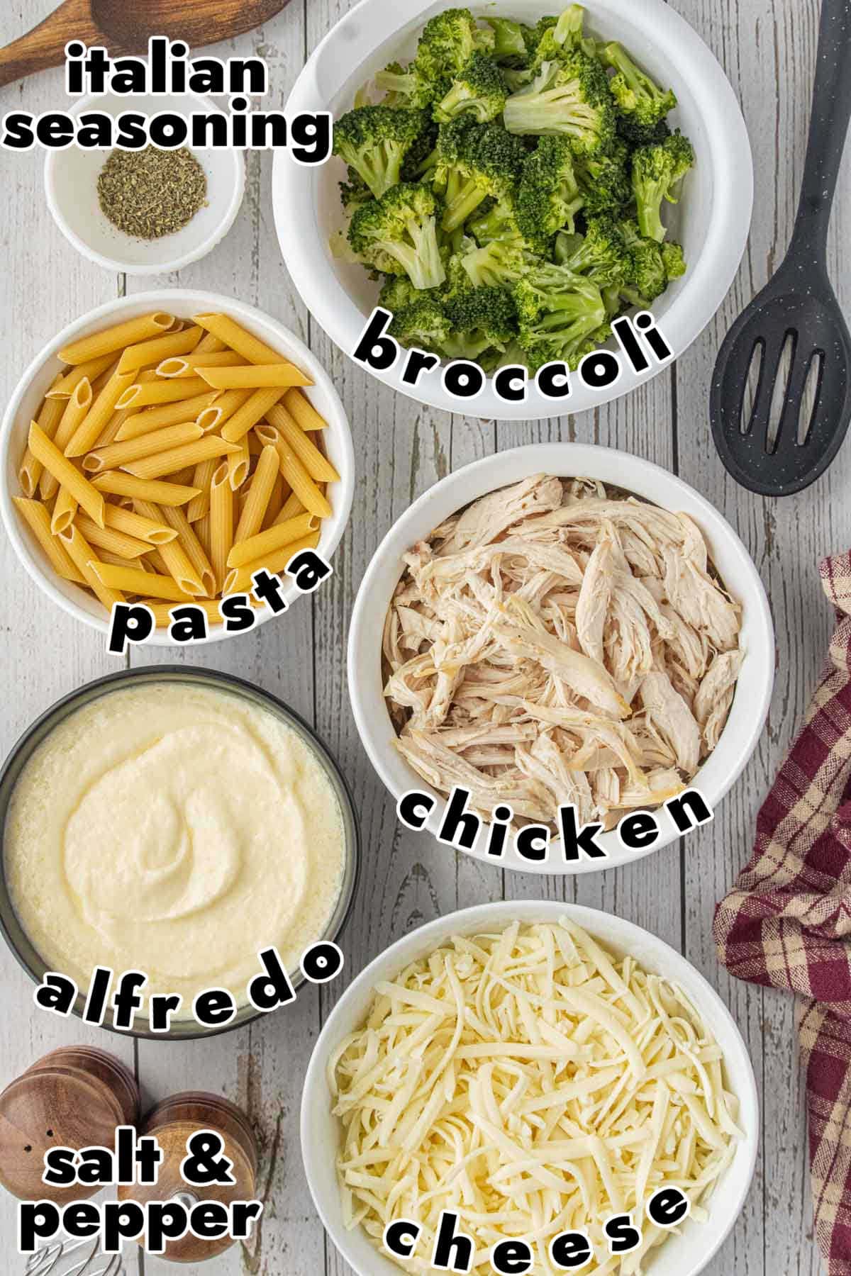ingredients for chicken and broccoli alfredo casserole including pasta broccoli chicken alfredo sauce and cheese