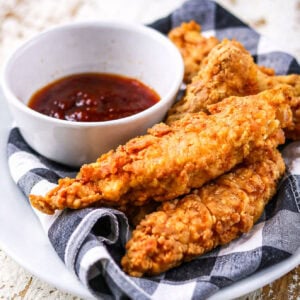 Closeup of the crispy homemade popeye's chicken tenders.