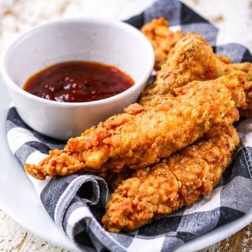 Closeup of the crispy homemade popeye's chicken tenders.