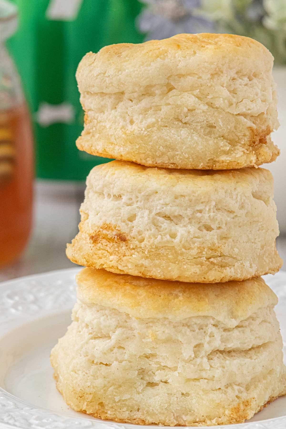 Tall stack of fluffy 3-ingredient biscuits showing soft layers and flaky texture