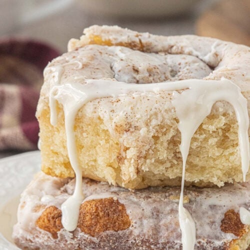 Easy no yeast cinnamon rolls with 2-ingredient dough topped with sweet icing and cinnamon.