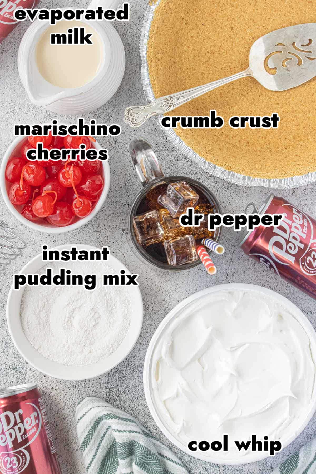 Ingredients for Dr Pepper icebox pie including Dr Pepper, instant pudding mix, Cool Whip, evaporated milk, graham cracker crust, and maraschino cherries.