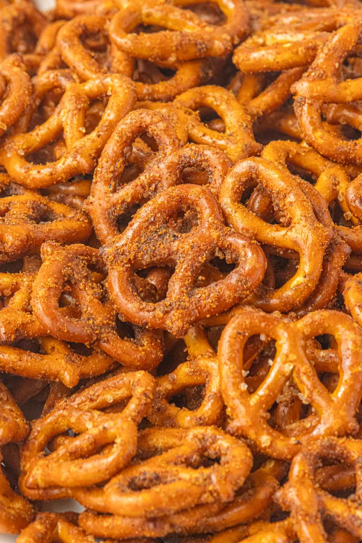 Close-up of crunchy slow cooker taco pretzels coated in buttery taco seasoning.