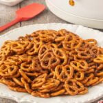 Seasoned taco pretzels on a white serving platter with crispy, buttery coating visible on every pretzel.
