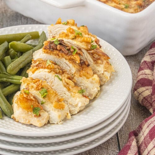 Sliced Ritz chicken breast with buttery cracker topping served with green beans