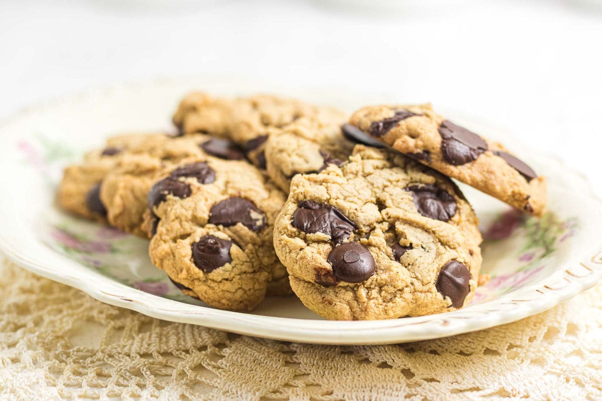 Close-up of chewy gluten-free brown butter chocolate chip cookies with large melted chocolate chips