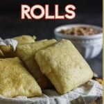 Pinterest pin for copycat Texas Roadhouse rolls showing soft, buttery homemade rolls with cinnamon butter and text reading “Soft, Buttery, Melt in Your Mouth.”