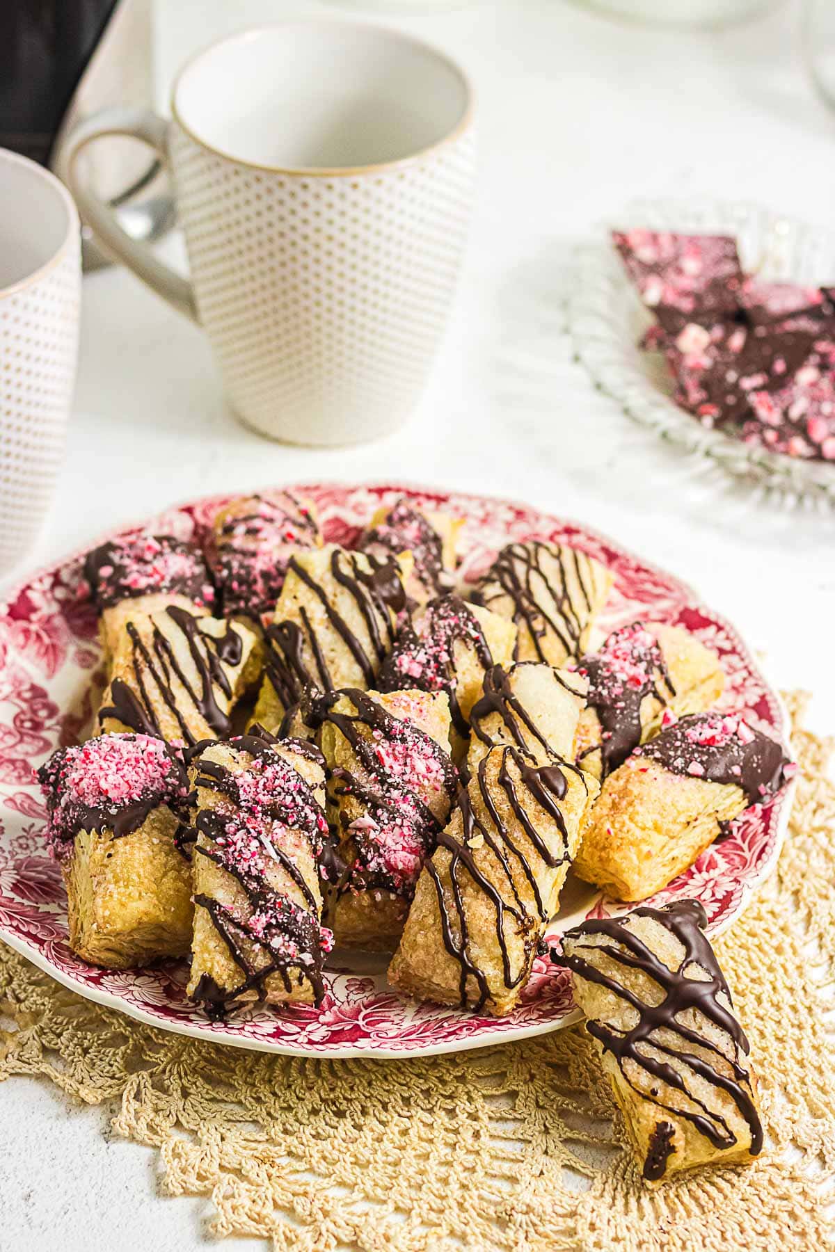 Chocolate peppermint puff pastry cookies with crisp sugar crust, bittersweet chocolate, and crushed candy canes.