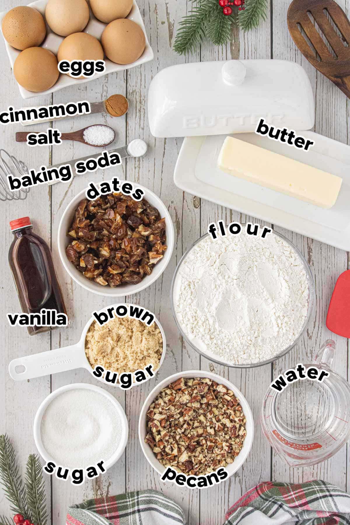 Ingredients for date nut pinwheel cookies, including chopped dates, pecans, flour, butter, eggs, sugar, and spices.