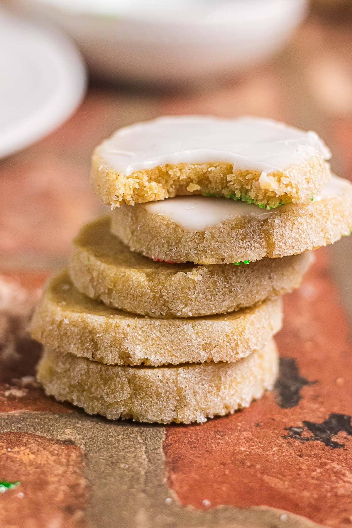 Stack of brown butter icebox cookies showing the tender crumb and sugared edges