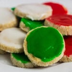 Brown butter icebox cookies decorated with red, green, and white Christmas icing