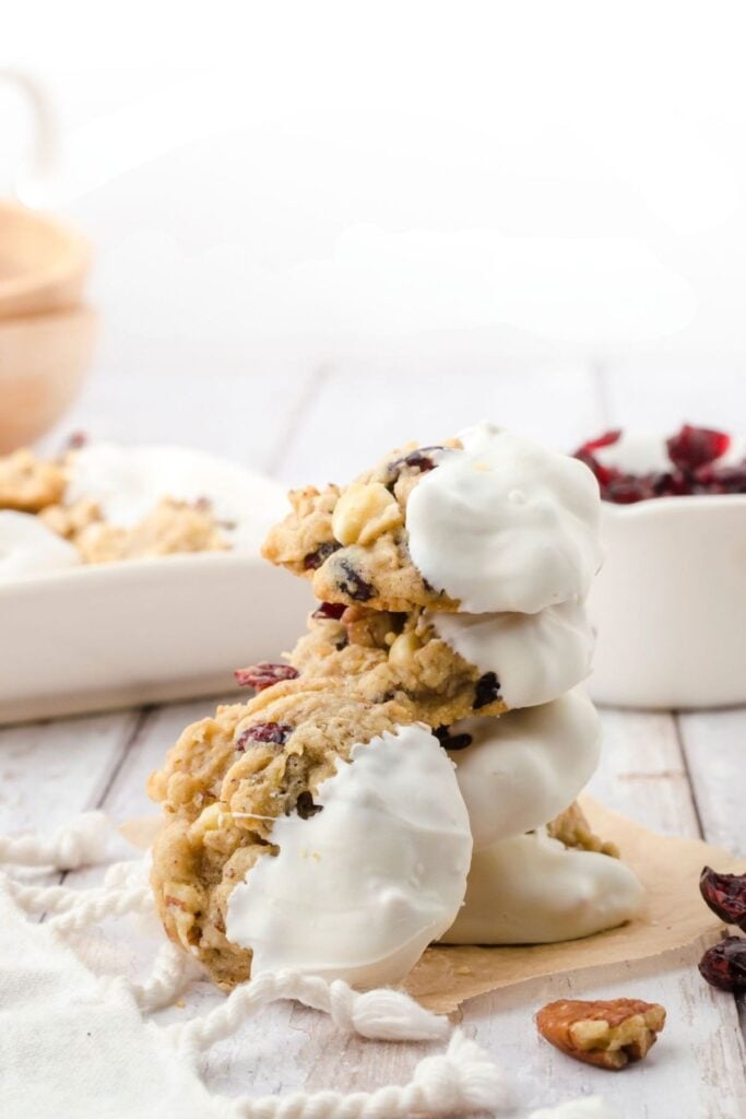 A stack of cookies on a white table.
